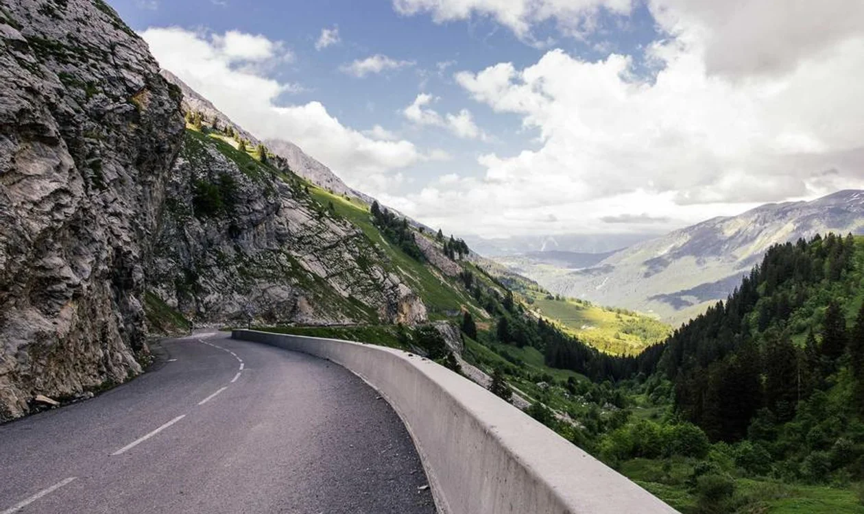 Briggs and Riley rolling duffel and Tumi Alpha Bravo Lance bag in airport business traveler scene