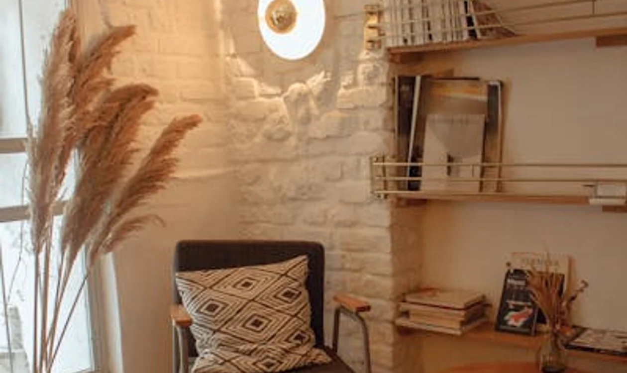 A Paris neighbourhood bistro in the 11th arrondissement with locals at outdoor tables and a handwritten chalkboard menu
