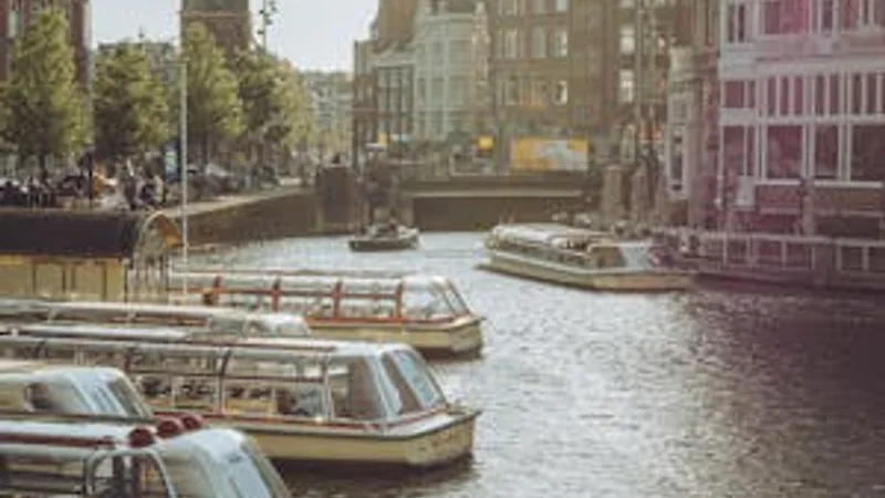 Amsterdam bicycles parked along a canal street