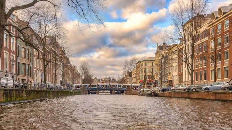 Amsterdam canal with historic houses and bridges