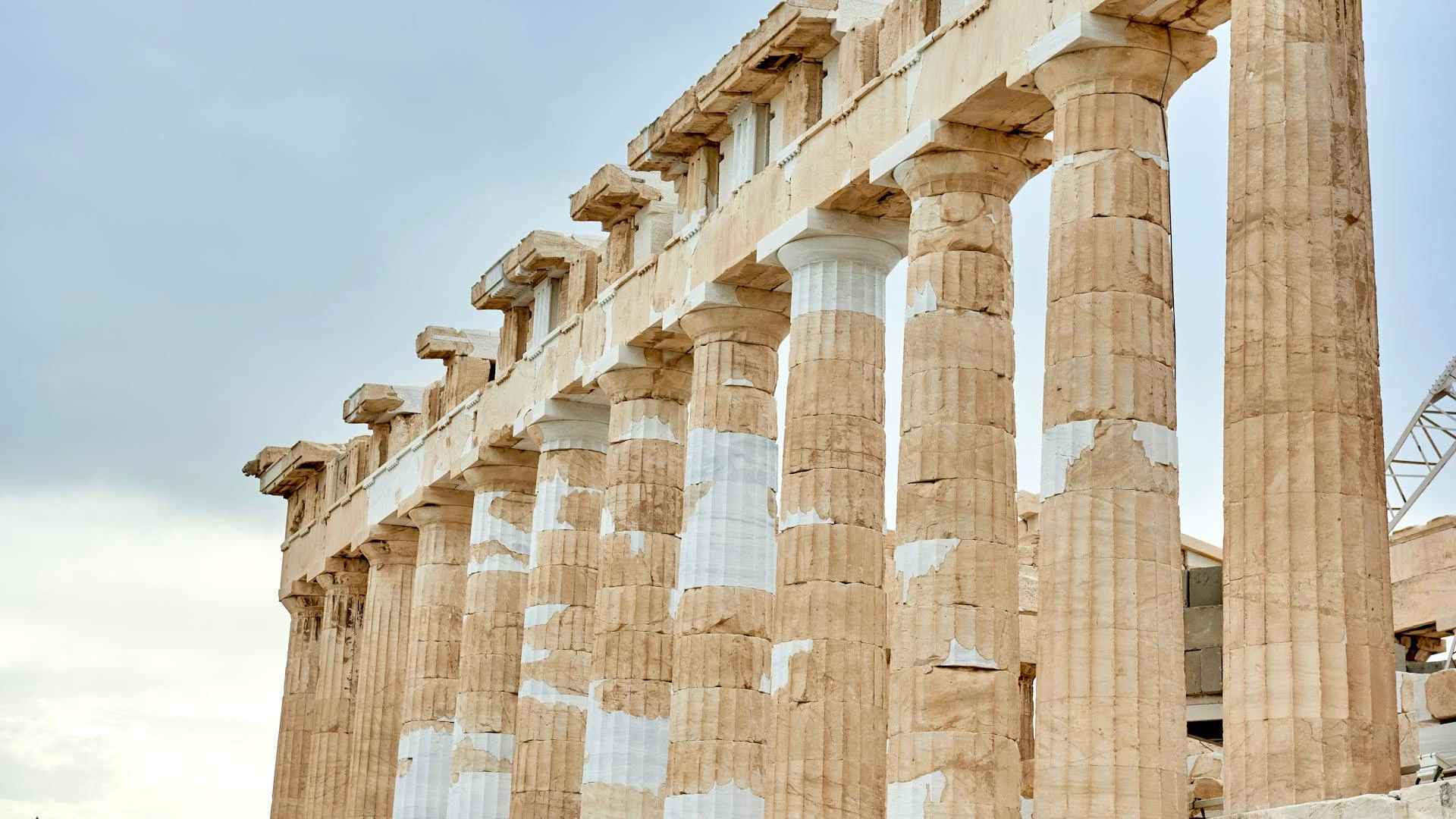 The Parthenon on the Acropolis of Athens against a blue sky