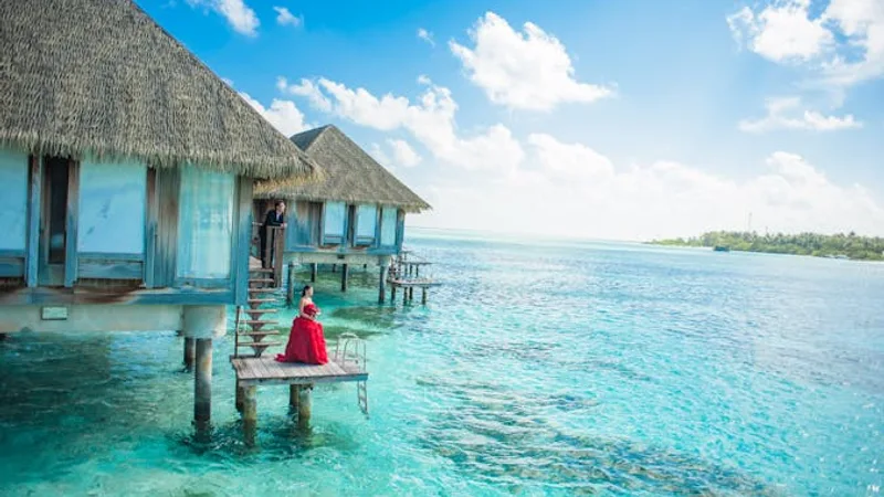 Maldives overwater bungalows above turquoise lagoon
