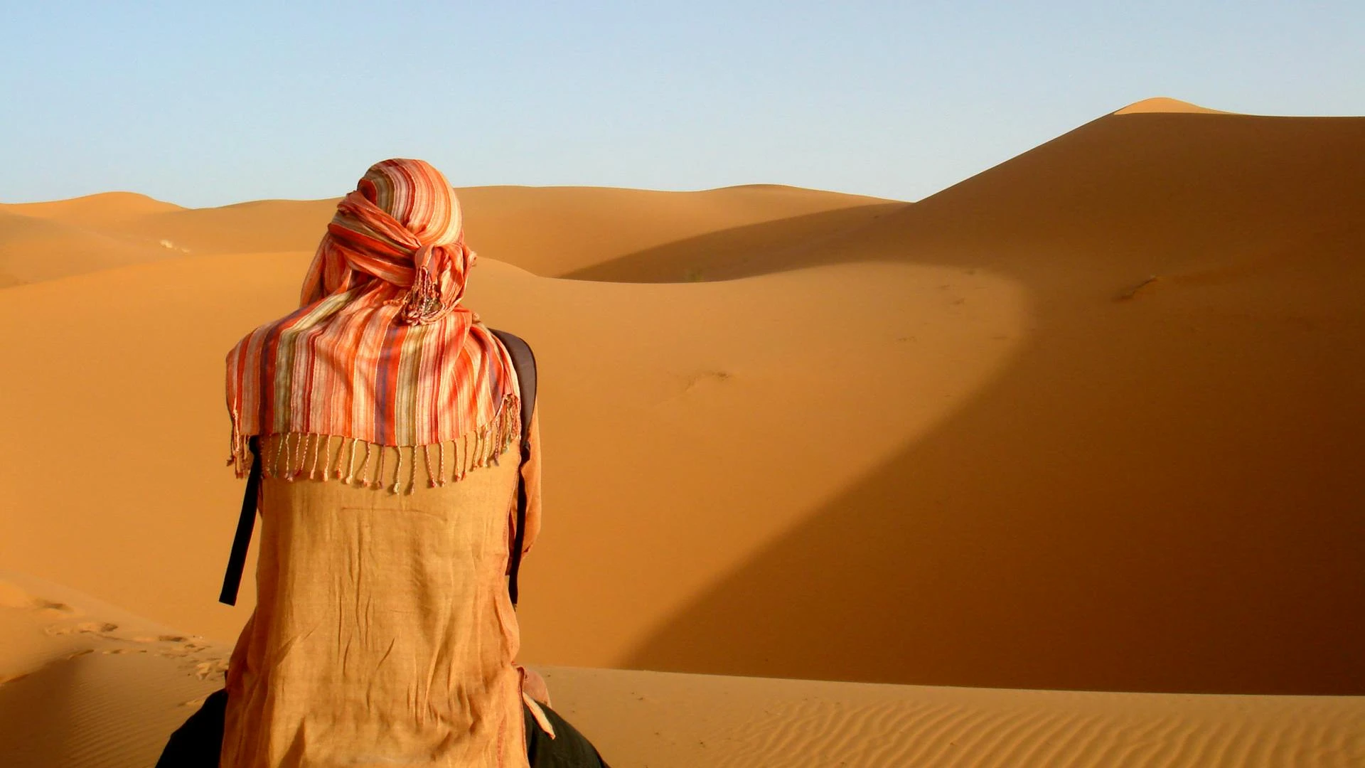 Marrakech Sahara desert sand dunes camel trek golden light