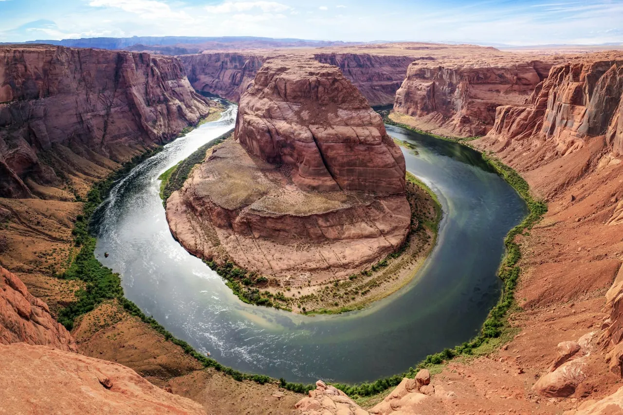 Horseshoe Bend on the Colorado River near Page, Arizona — a dramatic 270-degree river meander seen from 1,000 feet above