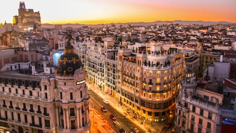 Barcelona city skyline at golden hour with historic buildings